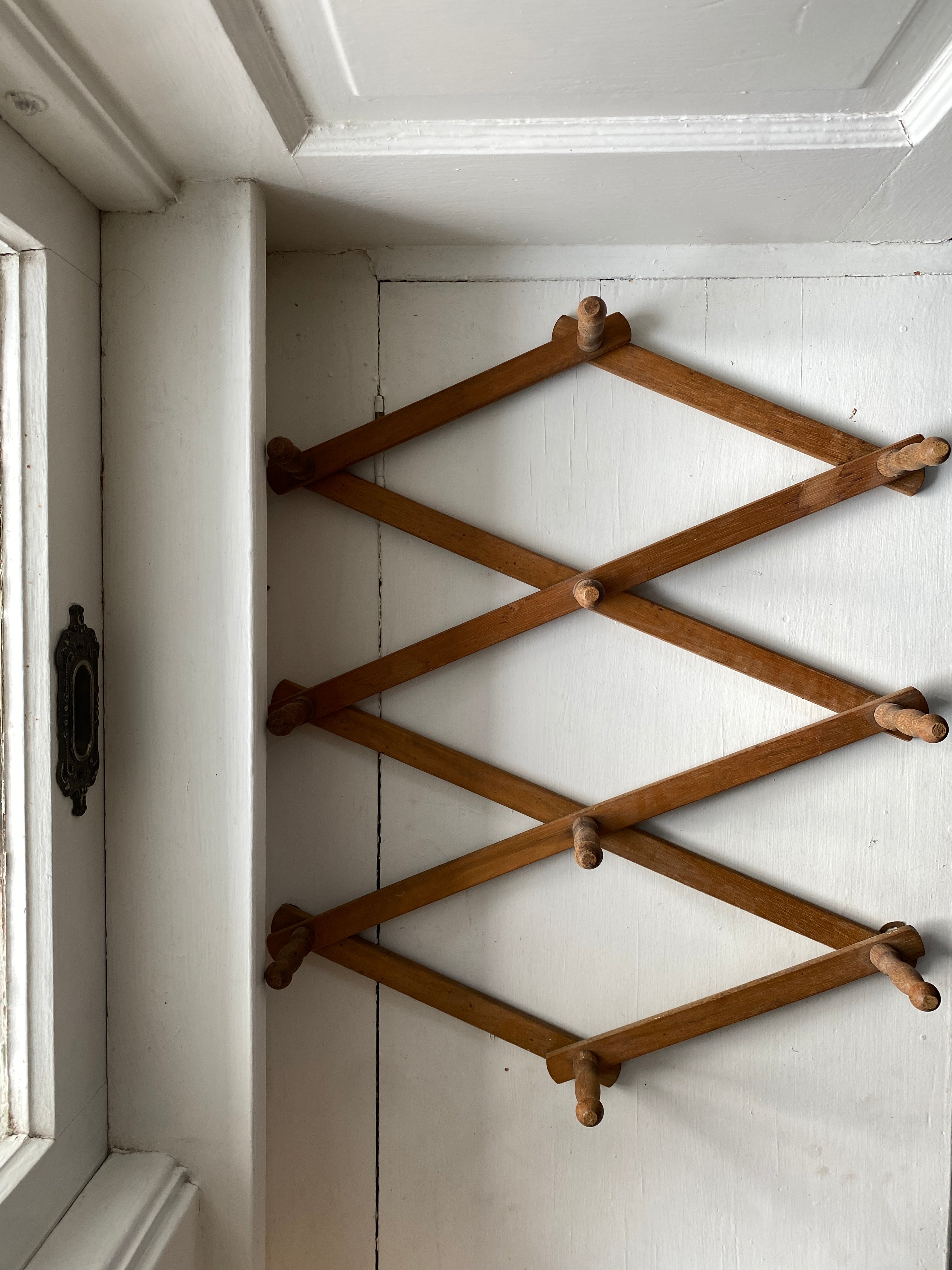 Vintage accordion peg outlet rack